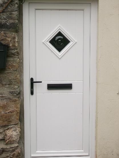 Cottage Bullion Door available as a Security door or Flood Door in White, Wood Grain, or a range of Door Colour Options