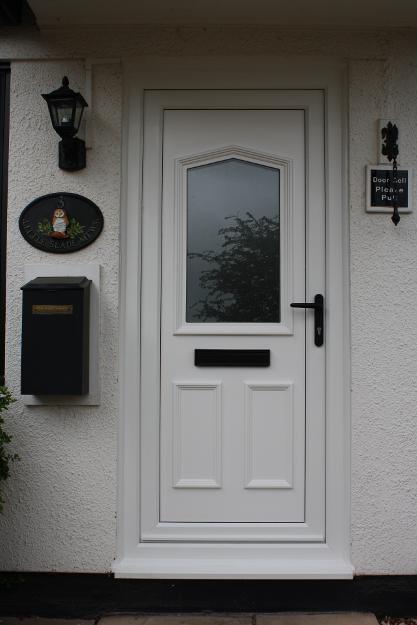 Chelsea Classic door available as a Security Door or Flood Door in white, Wood Grainm or a range of Door Colour Options