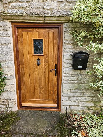 Georgian Door with Side Panel available as a Flood Door or Security Door in White, Wood Grain or a range of Door Colour Options.